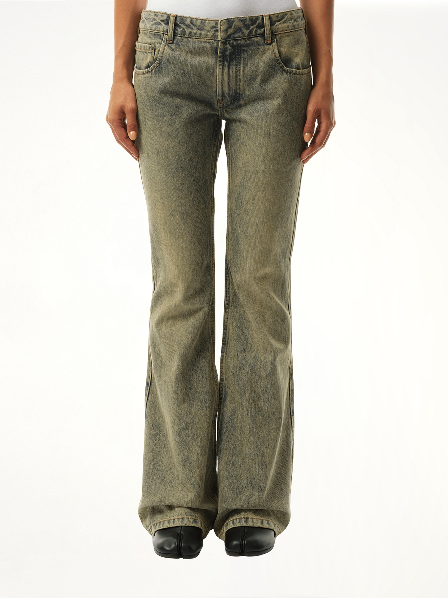 Image of a model wearing Denim. Productname: ENTIRE STUDIOS Slim-Flared Jeans in BLUE colour by brand - ENTIRE STUDIOS