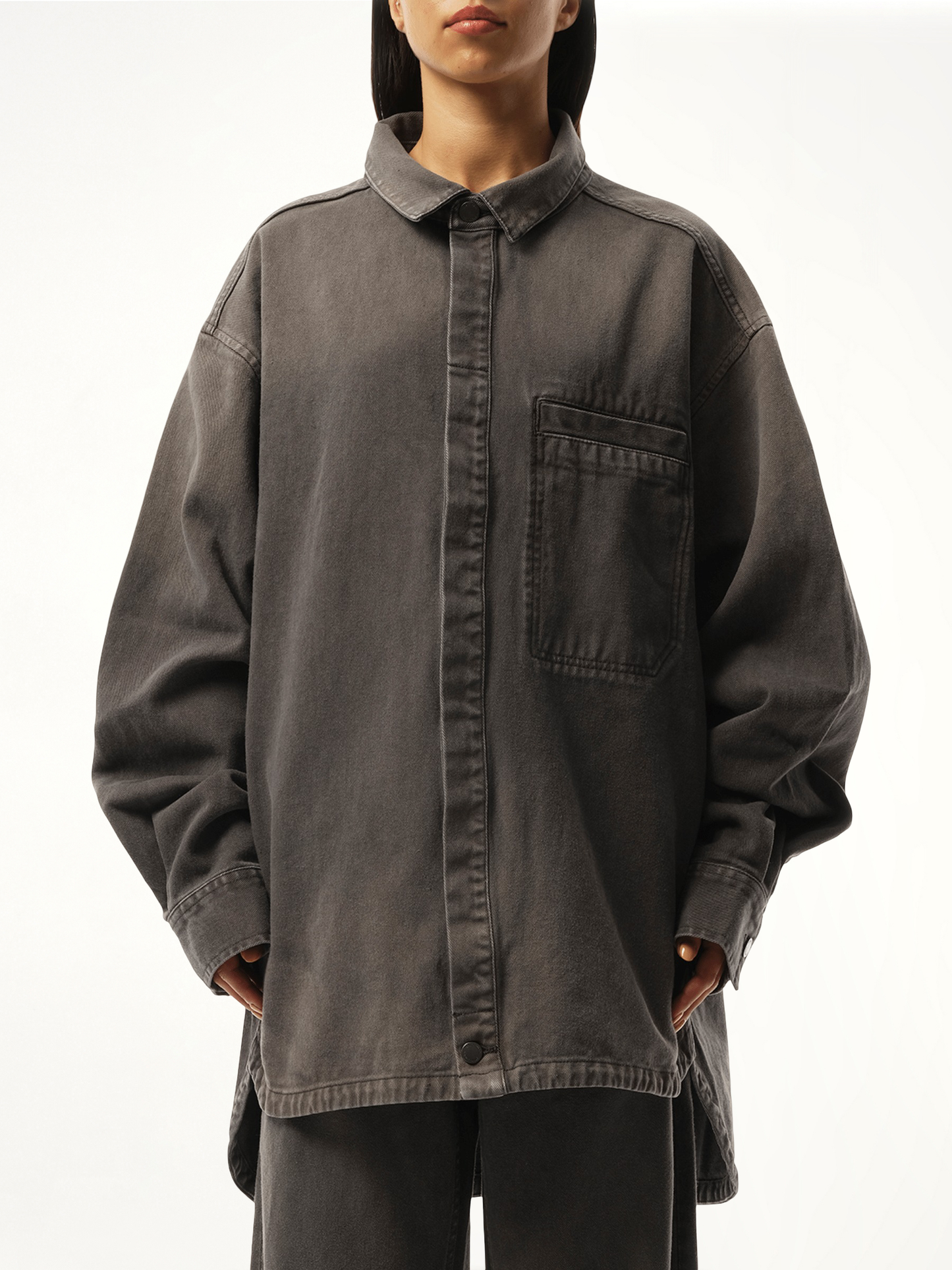 Image of a model wearing Tops. Productname: ENTIRE STUDIOS Herculean Shirt in GREY colour by brand - ENTIRE STUDIOS