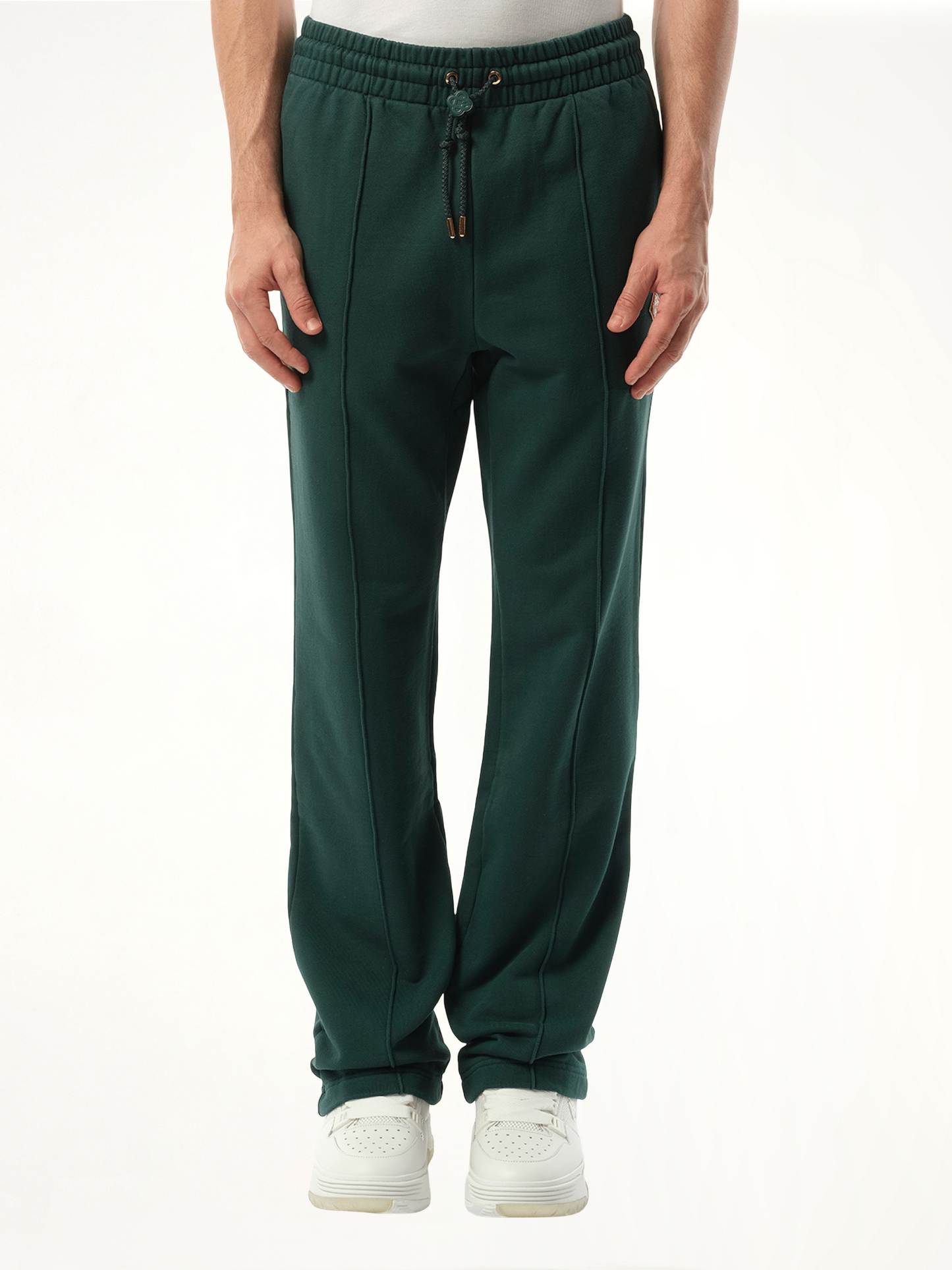 Image of a model wearing Pants. Productname: CASABLANCA Embroidered CC Patch Jogger in GREEN colour by brand - CASABLANCA