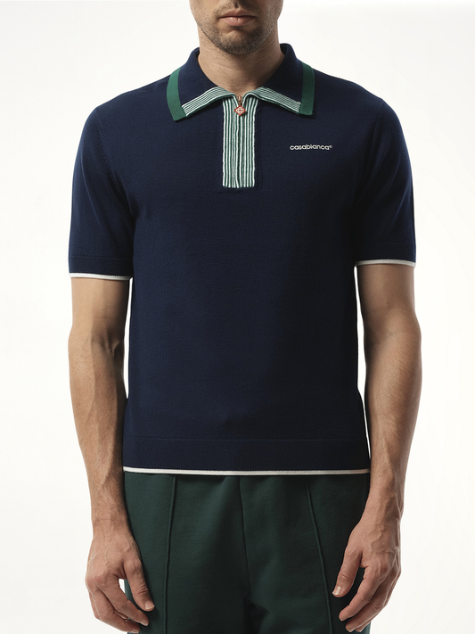 Image of a model wearing Tops. Productname: CASABLANCA Tennis Polo in NAVY colour by brand - CASABLANCA