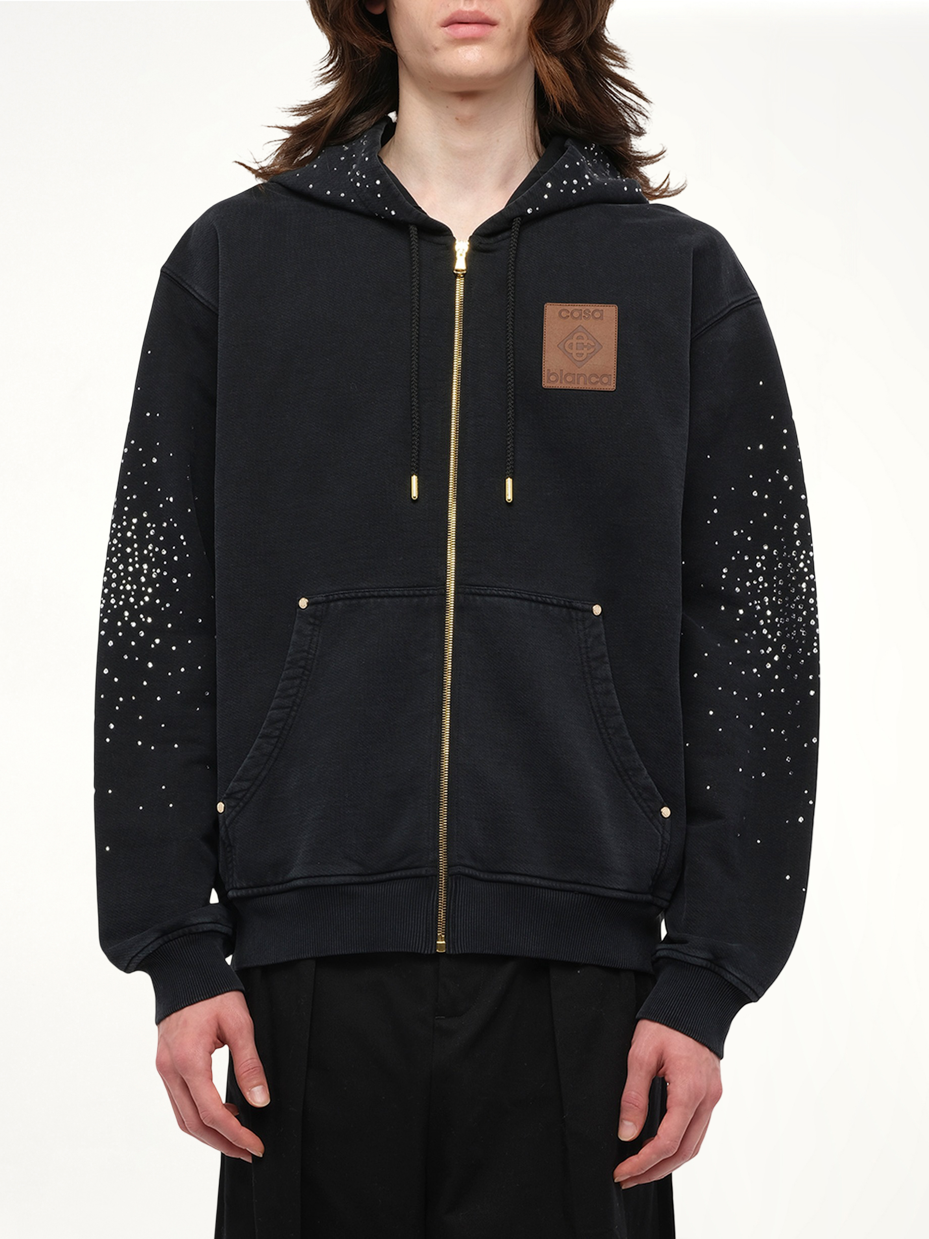 Image of a model wearing Outerwear. Productname: CASABLANCA La Premonition Hotfix Printed Zip Hoodie in BLACK colour by brand - CASABLANCA