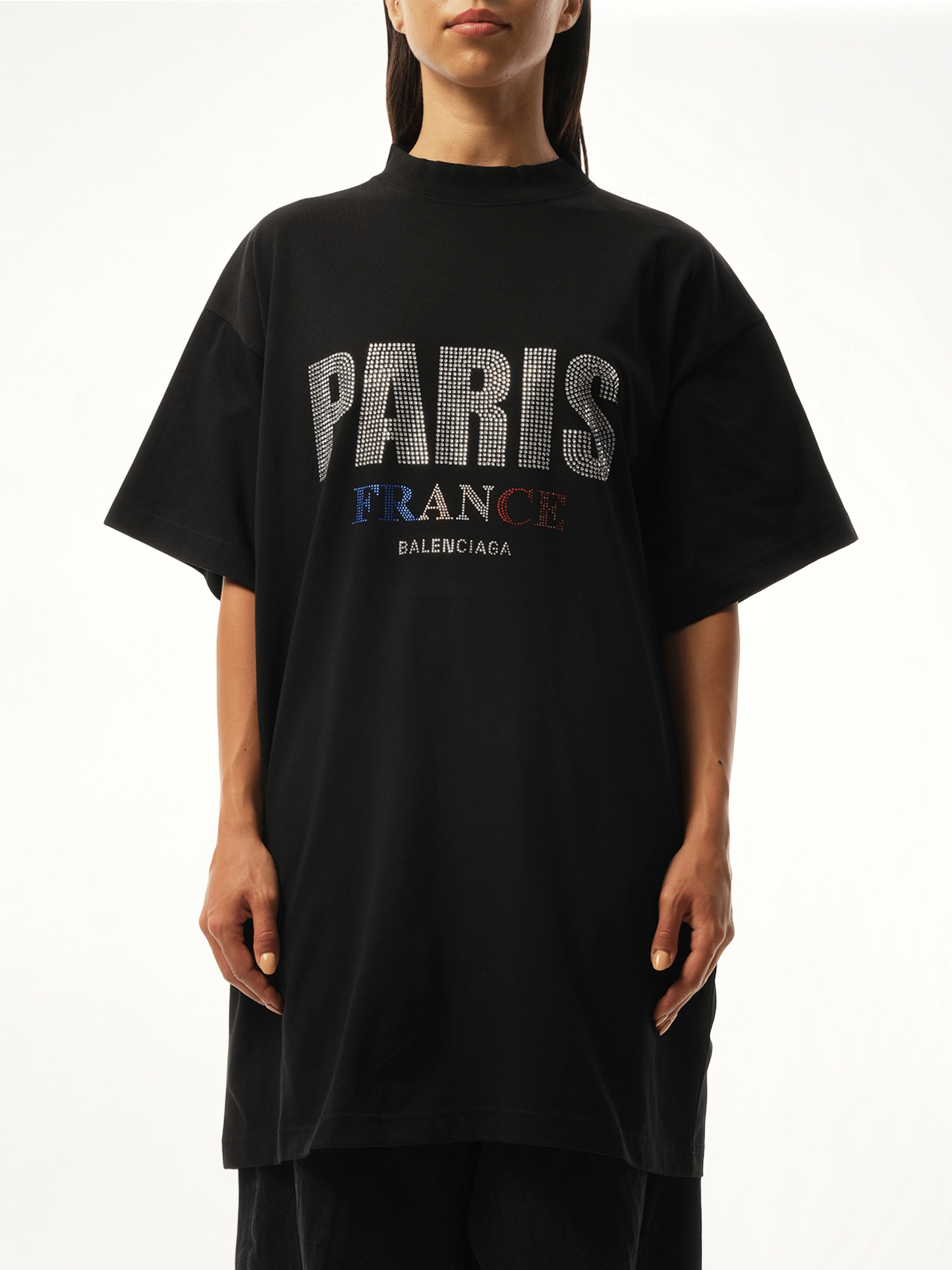 Image of a model wearing Tops. Productname: BALENCIAGA Paris Strass Oversized T-Shirt in BLACK colour by brand - BALENCIAGA