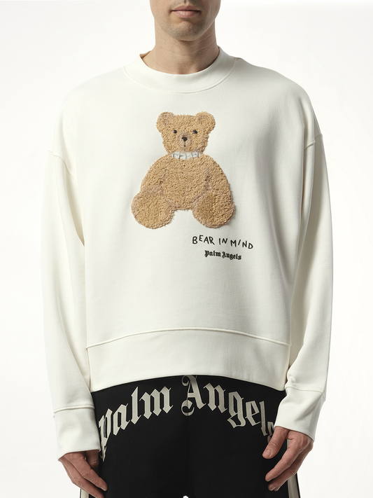 Image of a model wearing Outerwear. Productname: PALM ANGELS Bear in White colour by brand - PALM ANGELS
