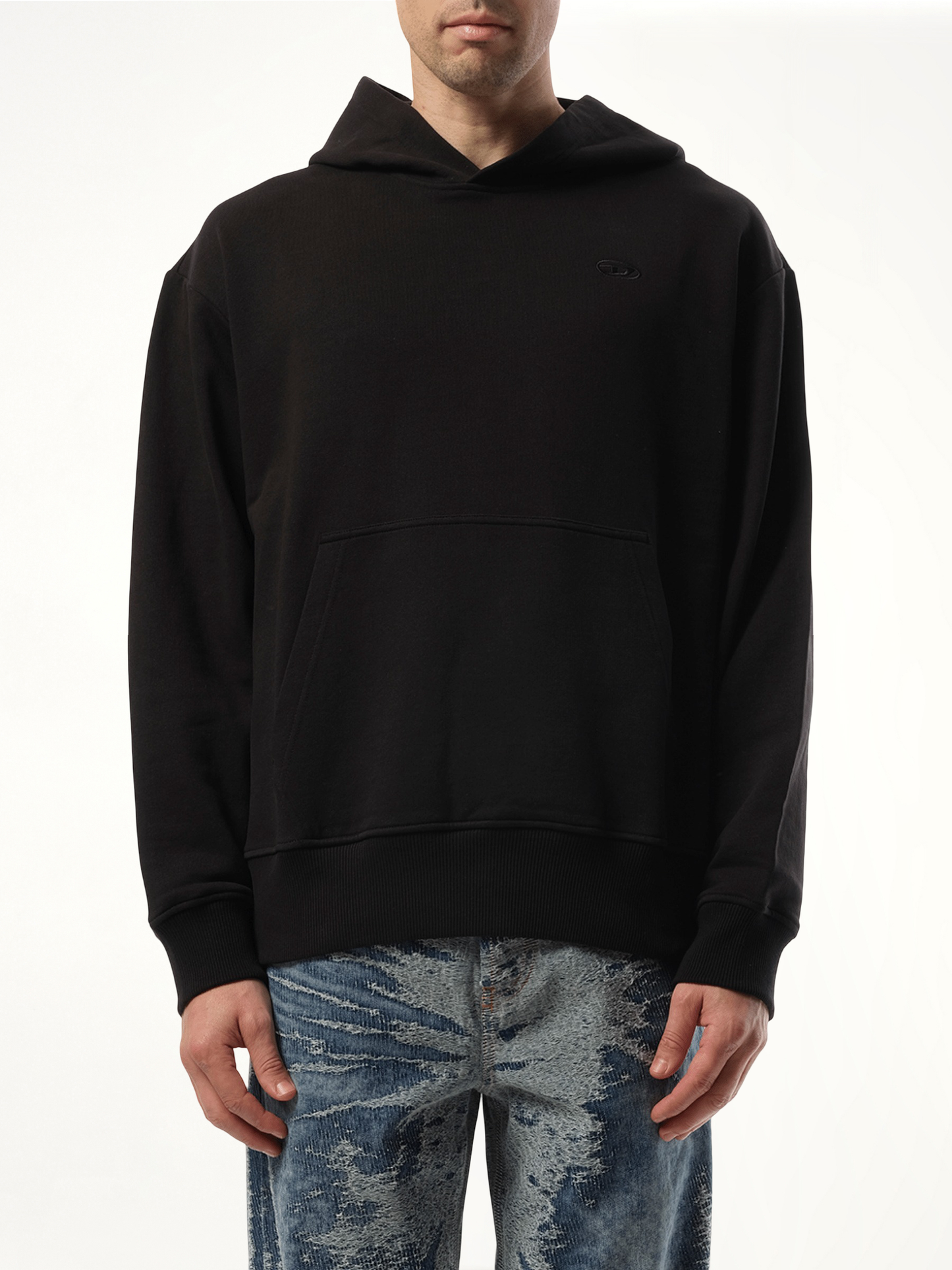 Image of a model wearing Outerwear. Productname: DIESEL S-Macs Oval D Hoodie in Black colour by brand - DIESEL