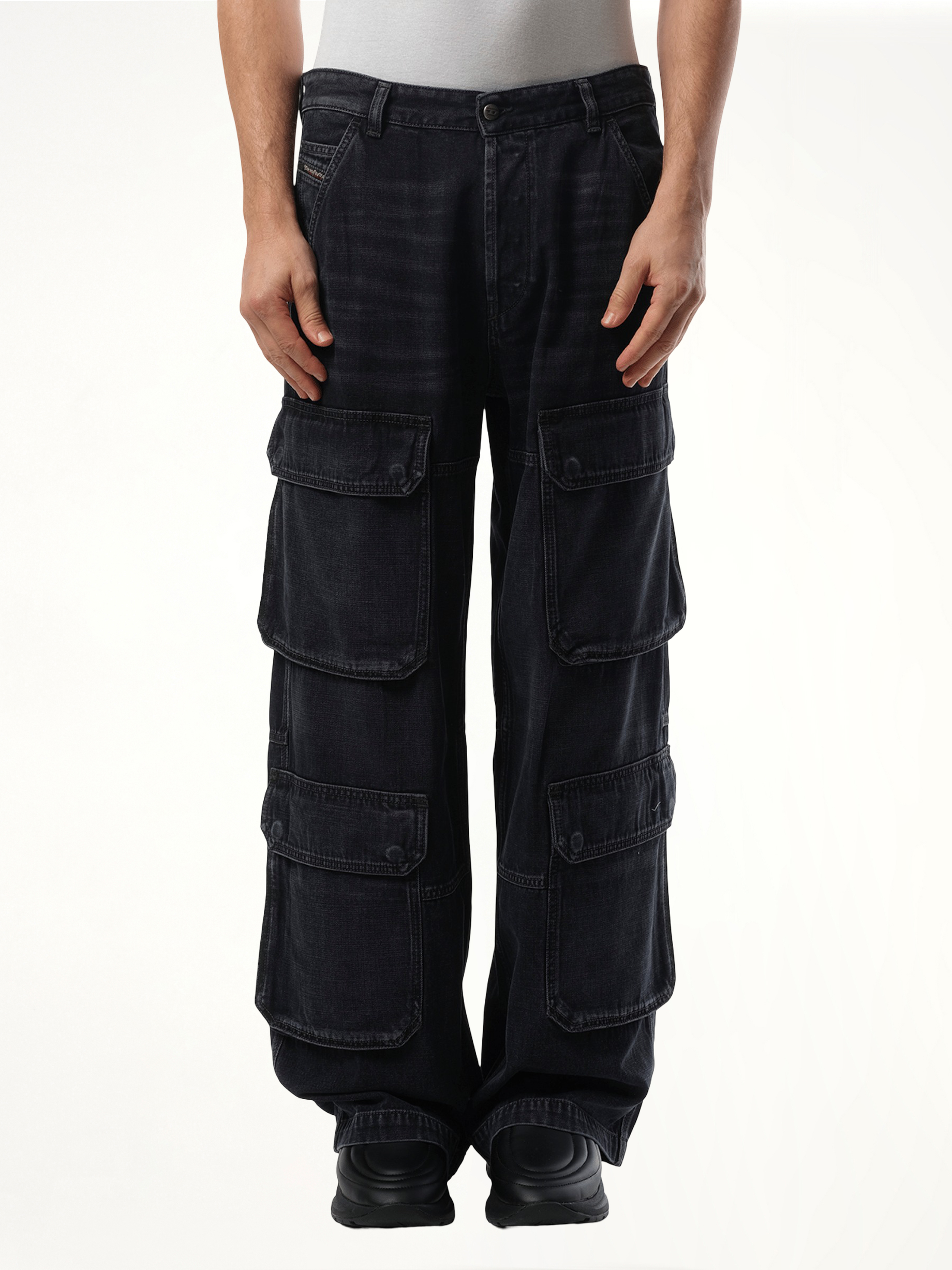 Image of a model wearing Pants. Productname: DIESEL D-Touch Cargo Pants in Black colour by brand - DIESEL