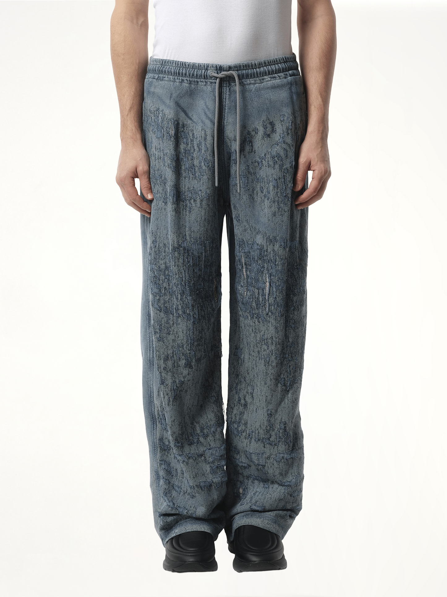 Image of a model wearing Pants. Productname: DIESEL Runway Enimos Pants in Blue colour by brand - DIESEL