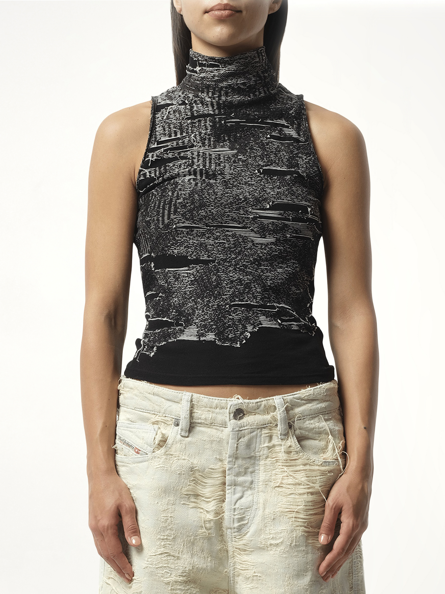 Image of a model wearing Tops. Productname: DIESEL Distressed Halterneck Top in Black colour by brand - DIESEL