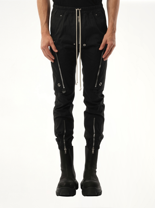 Image of a model wearing Pants. Productname: RICK OWENS Bauhaus Cargo in Black colour by brand - RICK OWENS
