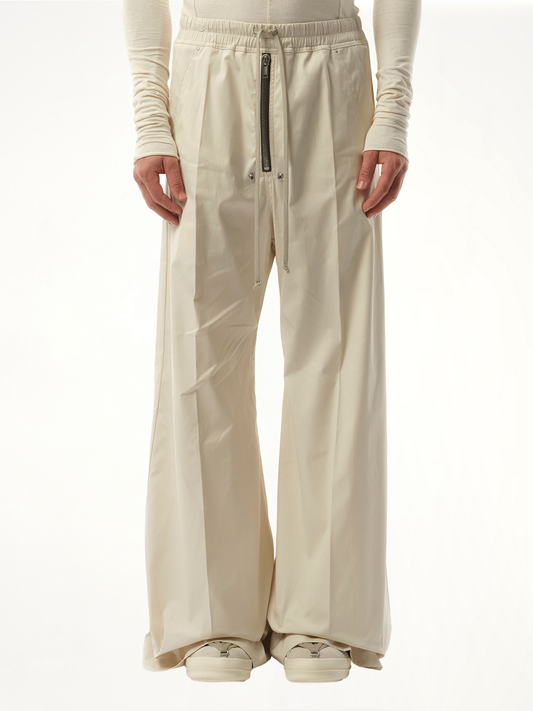 Image of a model wearing Pants. Productname: RICK OWENS Wide Bela Pants in White colour by brand - RICK OWENS