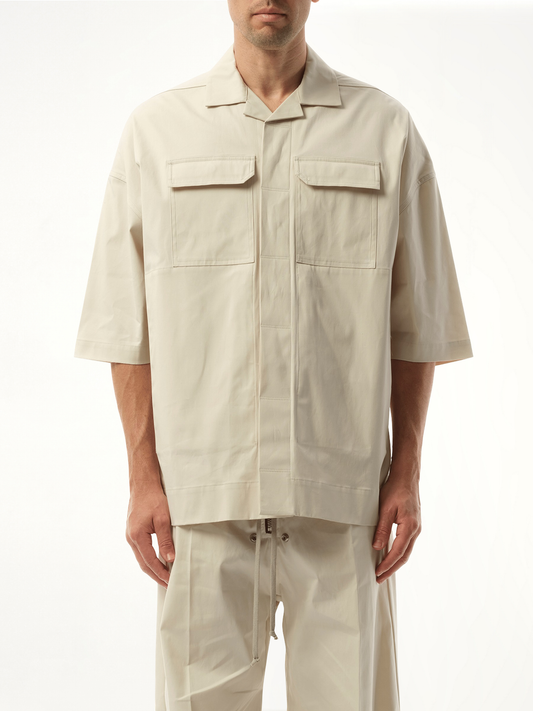 Image of a model wearing Tops. Productname: RICK OWENS Magnum Tommy Shirt in White colour by brand - RICK OWENS