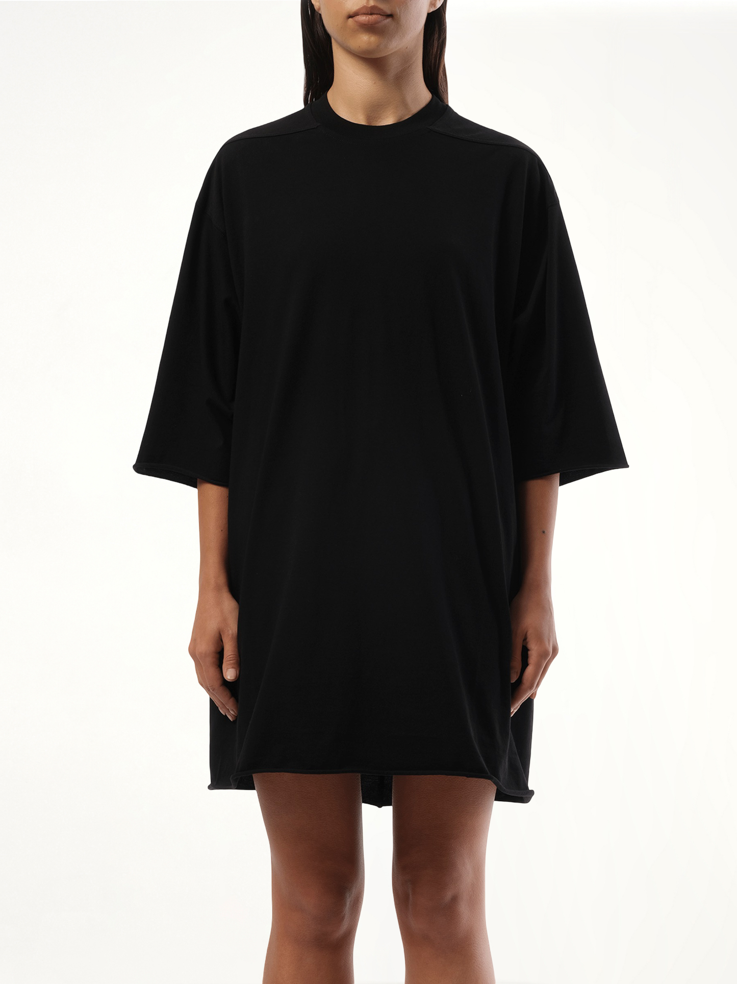 Image of a model wearing Tops. Product name - Jumbo SS T in Black colour by brand - RICK OWENS