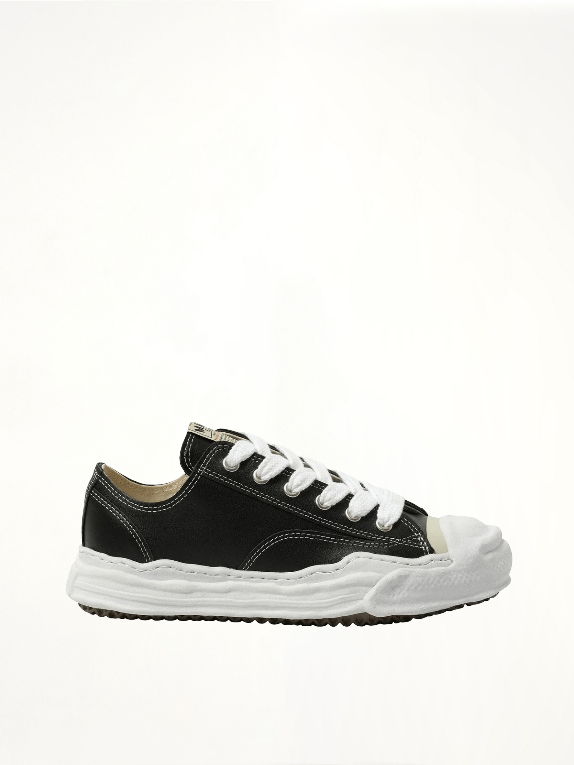 Image of Sneakers. Product name - Hank OG Leather Sneaker in Black colour by brand - MAISON MIHARA YASUHIRO