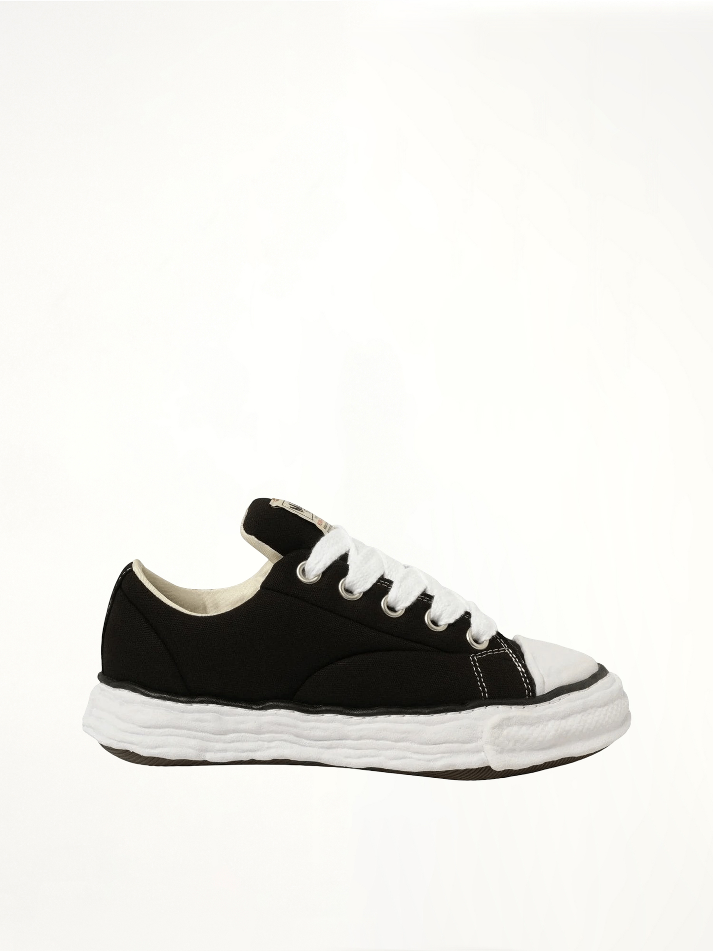 Image of Sneakers. Product name - Peterson 23 OG Padded Sneaker in Black colour by brand - MAISON MIHARA YASUHIRO