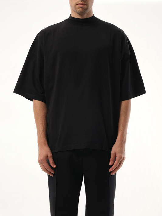 Image of a model wearing Tops. Productname: JIL SANDER Mock Neck T-Shirt in BLACK colour by brand - JIL SANDER