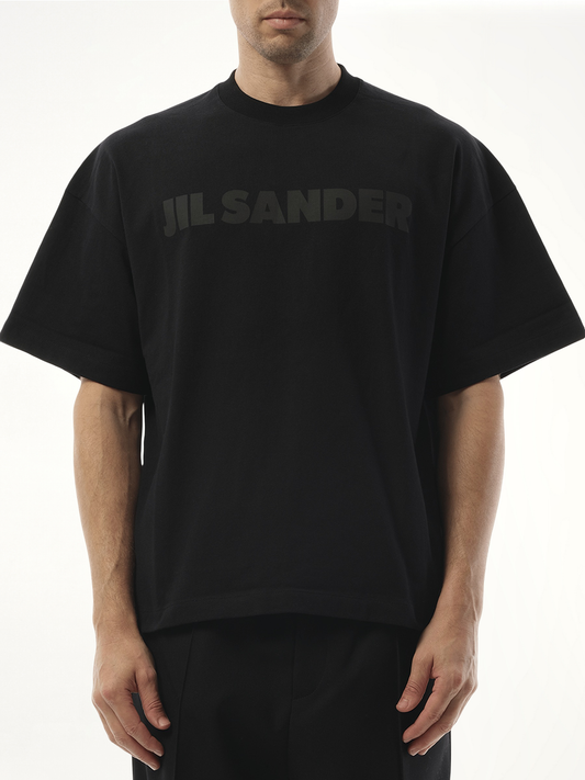 Image of a model wearing Tops. Productname: JIL SANDER Tonal Jil Sander Logo T-Shirt in BLACK colour by brand - JIL SANDER