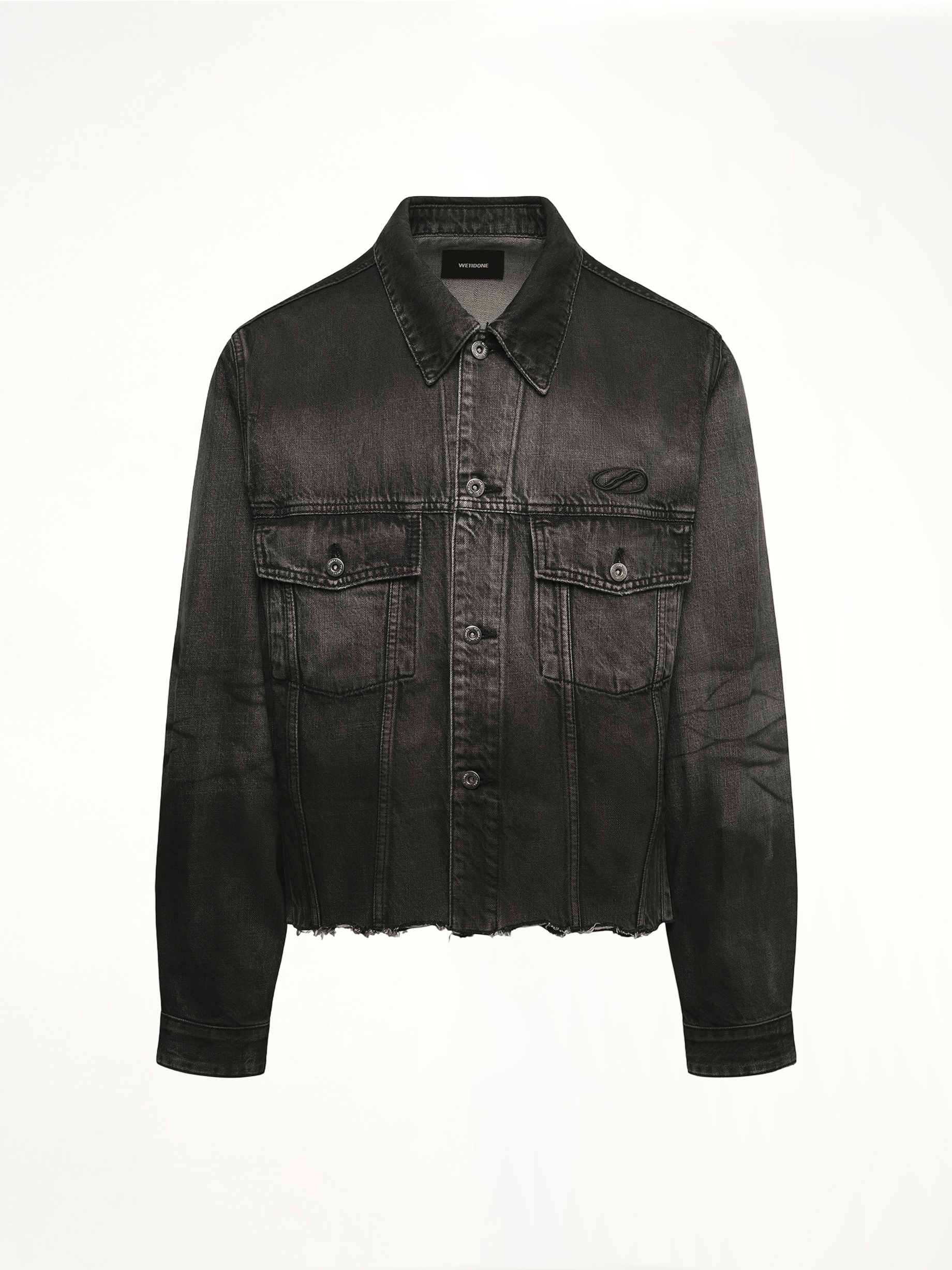 Image of a model wearing Outerwear. Productname: WE11DONE Dark-Spray Detail Denim Jacket in Black colour by brand - WE11DONE