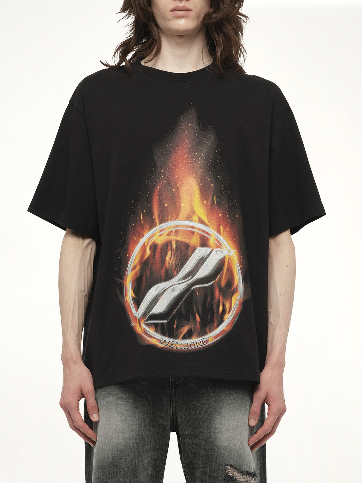 Image of a model wearing Tops. Productname: WE11DONE Meteor Print T-Shirt in Black colour by brand - WE11DONE