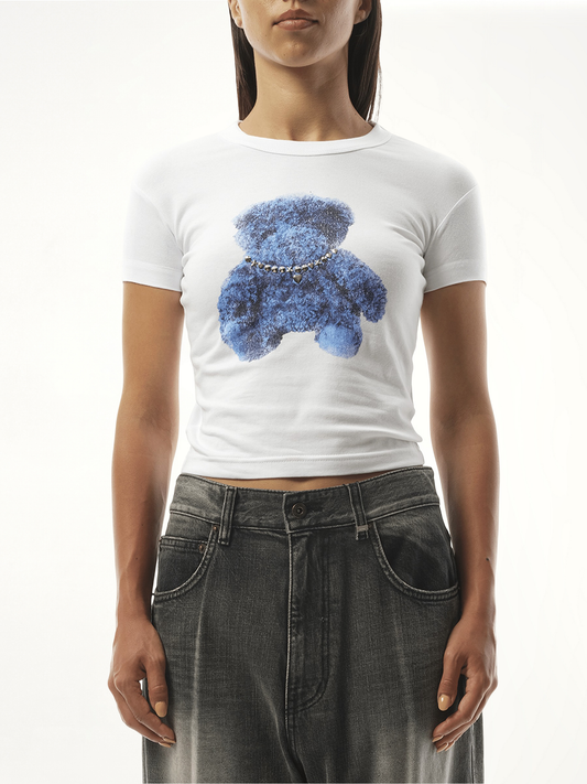 Image of a model wearing Tops. Productname: WE11DONE Studded Bear Cropped T-Shirt in White colour by brand - WE11DONE