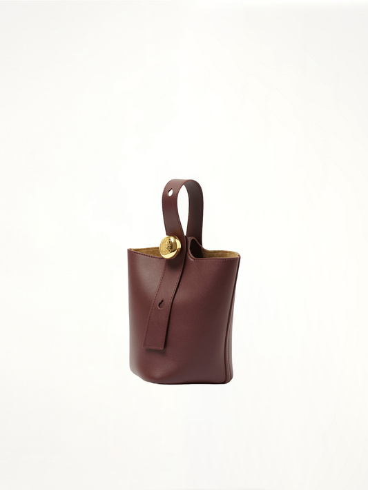 Image of Bags. Product name - Pebble Bucket Mini in Burgundy colour by brand - LOEWE