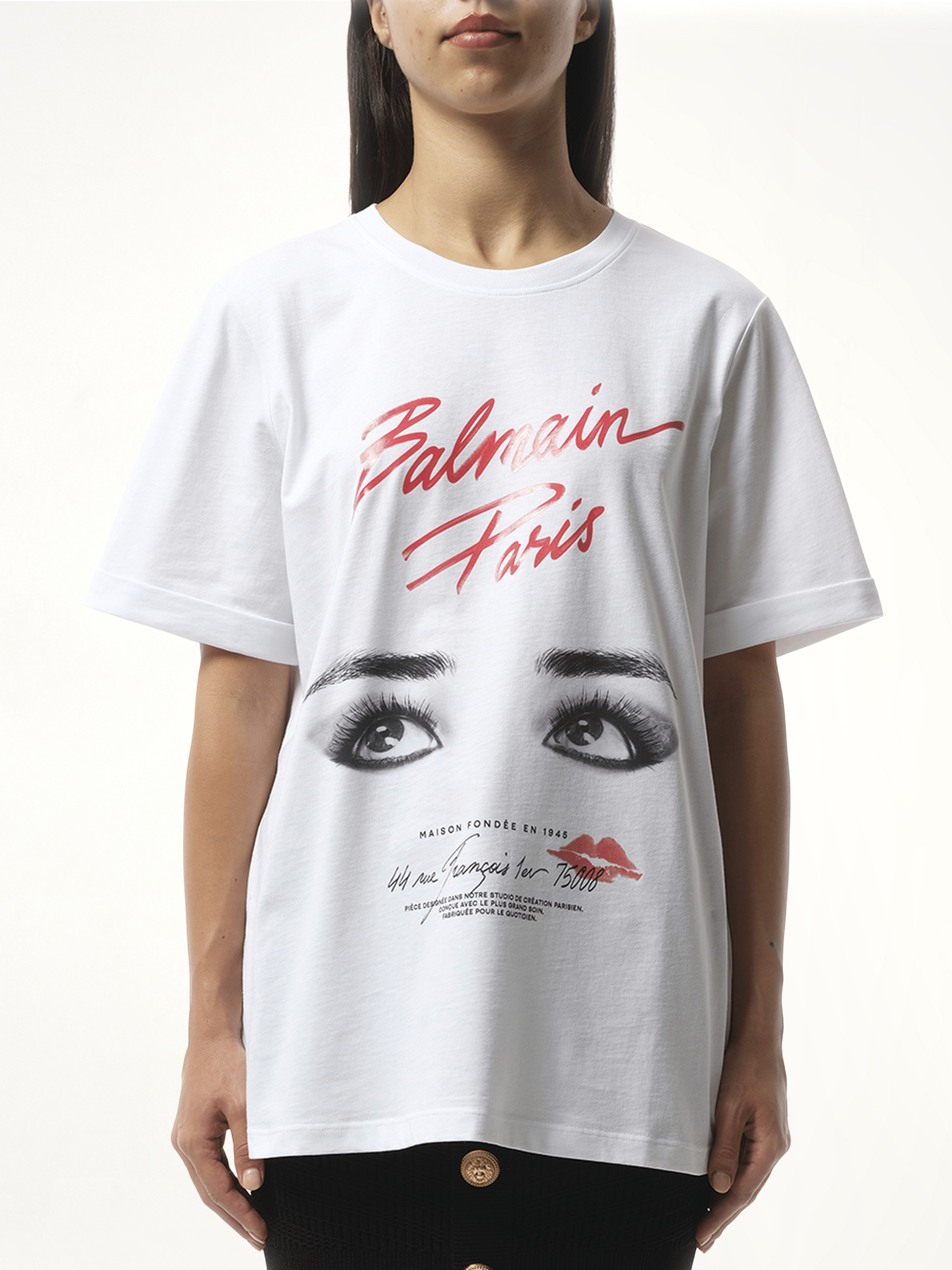 Image of a model wearing Tops. Productname: BALMAIN Balmain Paris Eyes Print T-Shirt in WHITE colour by brand - BALMAIN