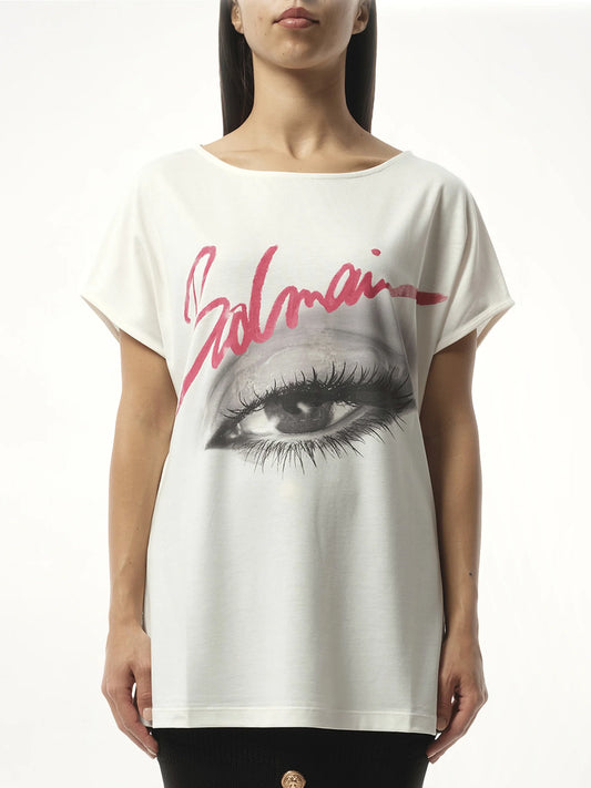 Image of a model wearing Tops. Product name - Boatneck Balmain Eye Print Top in White colour by brand - BALMAIN