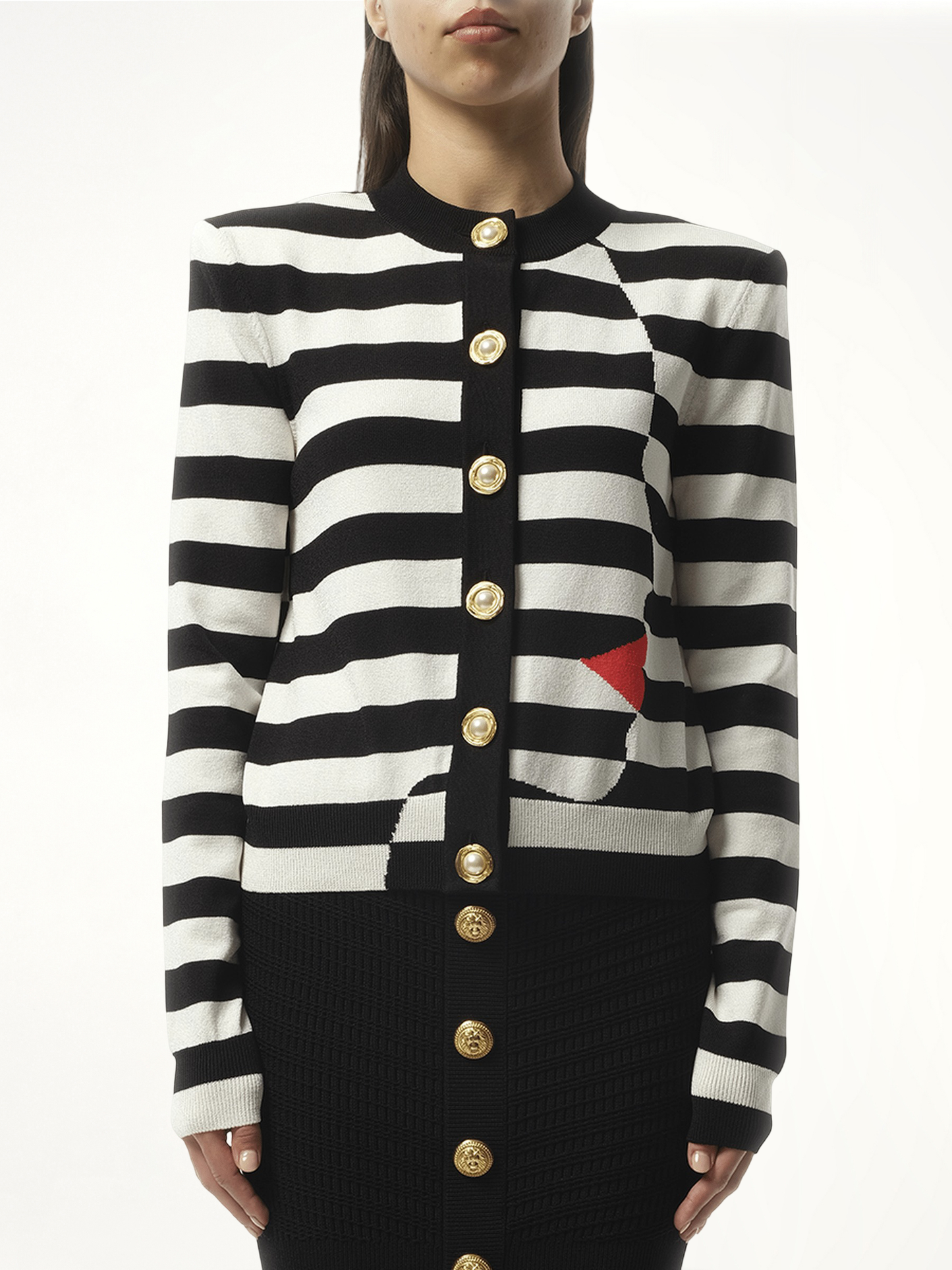 Image of a model wearing Outerwear. Productname: BALMAIN Buttoned Face Mariniere Knit Cardigan in BLACK colour by brand - BALMAIN