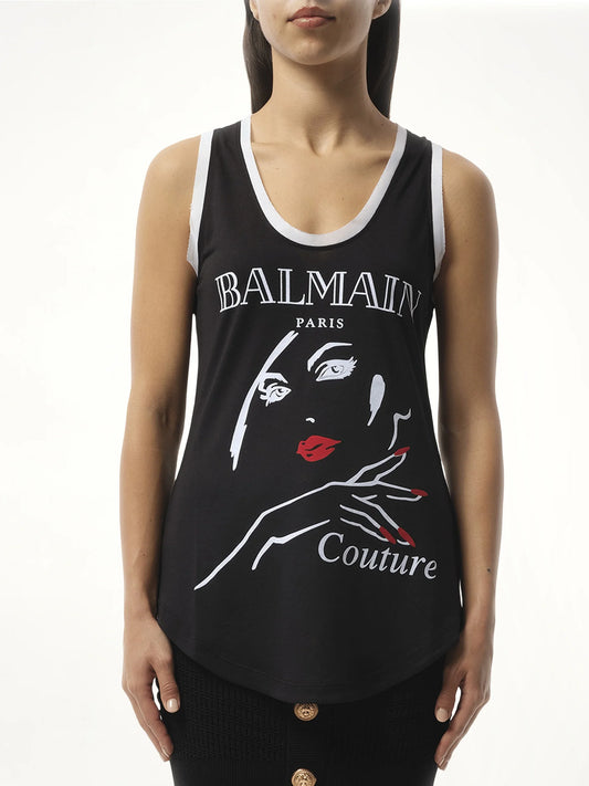 Image of a model wearing Tops. Product name - Balmain Beauty Print Jersey & Muslin Top in Black colour by brand - BALMAIN