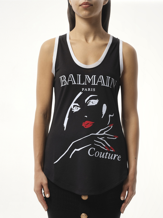 Image of a model wearing Tops. Productname: Balmain Beauty Print Jersey & Muslin Top in Black colour by brand - BALMAIN