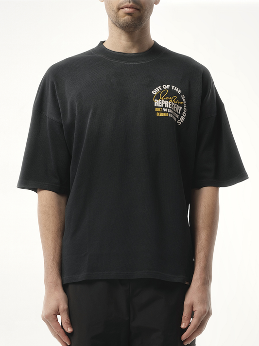 Image of a model wearing Tops. Productname: REPRESENT Out Of The Shadows T-Shirt in BLACK colour by brand - REPRESENT