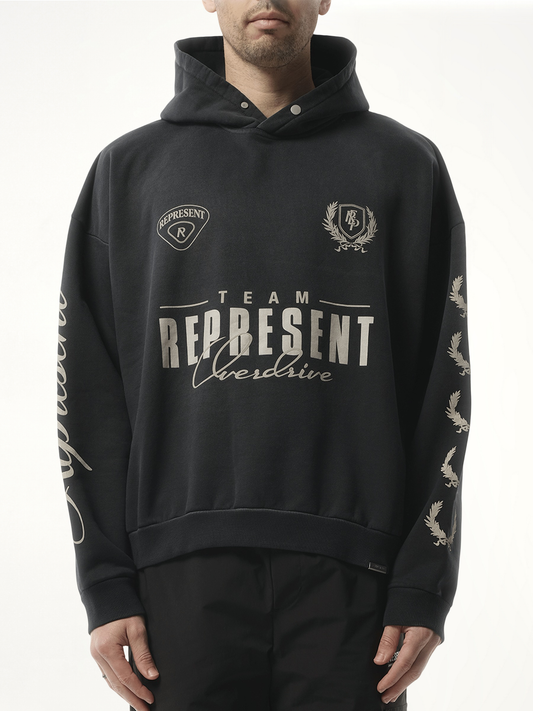 Image of a model wearing Outerwear. Productname: REPRESENT World Championship Hoodie in BLACK colour by brand - REPRESENT