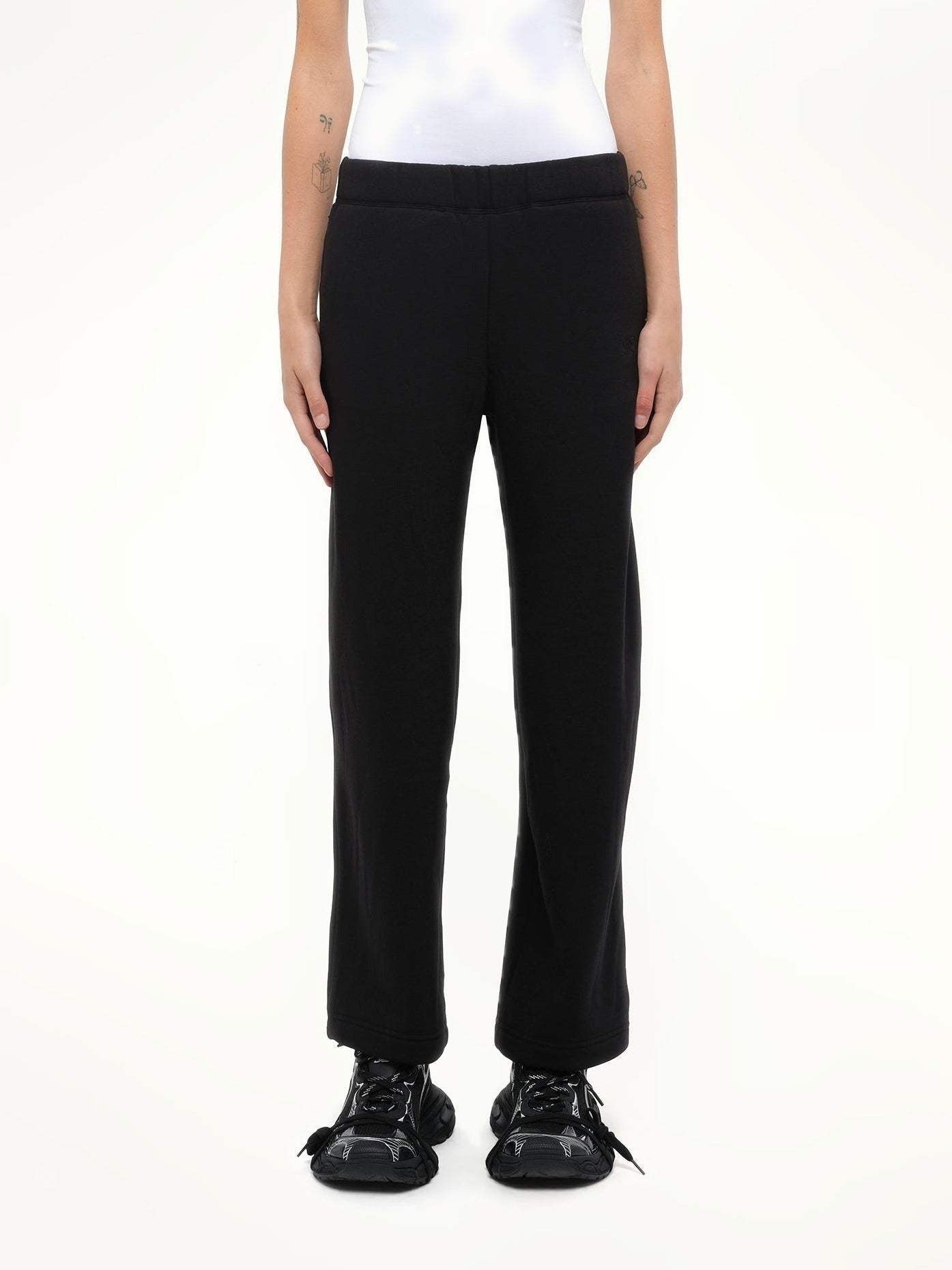 Image of a model wearing Pants. Product name - Ultra Soft Casual Sweatpants in Black colour by brand - FAX COPY EXPRESS