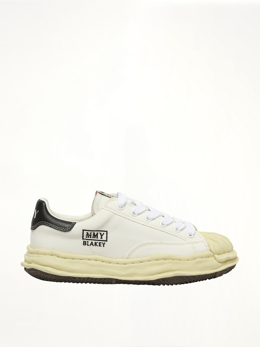Image of Sneakers. Product name - Blakey OG Vintage Leather Low Sneaker in White colour by brand - MAISON MIHARA YASUHIRO