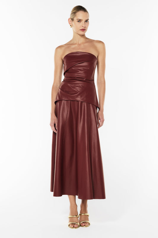 Image of a model wearing Skirts. Productname: Infinite Limits Skirt in WINE colour by brand - Manning Cartell