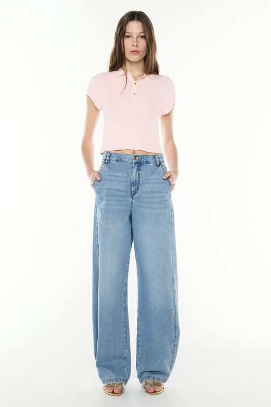 Image of a model wearing Tops. Productname: Firm Favourite Knit Polo in PALE PINK colour by brand - Manning Cartell