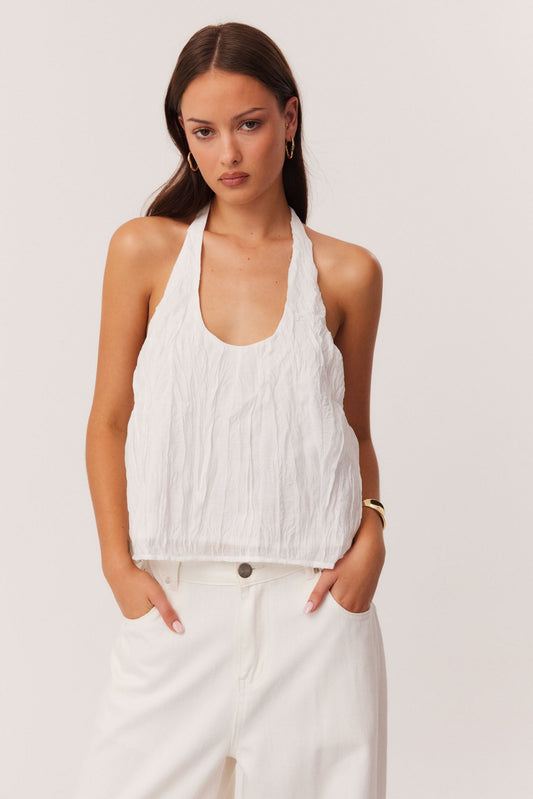 Image of a model wearing Tops. Productname: SNDYS BRANDI CRINKLE TOP in White colour by brand - SNDYS