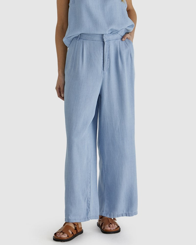 Image of a model wearing Pants. Product name - Rye Pant Chambray in Chambray colour by brand - Sass Clothing