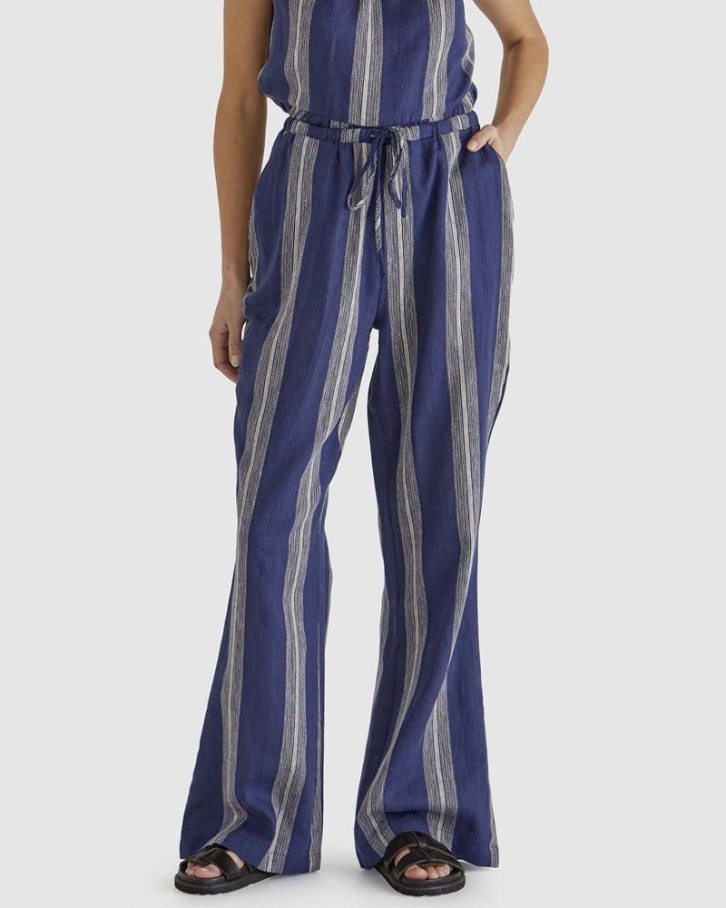 Image of a model wearing Pants. Product name - Lizzy Pant Navy Stripe in Navy Stripe colour by brand - Sass Clothing