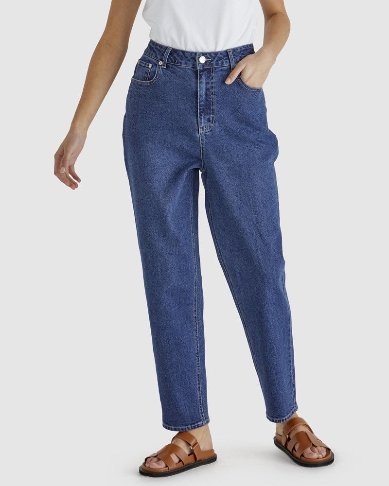 Image of a model wearing Pants. Product name - Olive Jean in 78 Indigo Wash colour by brand - Sass Clothing