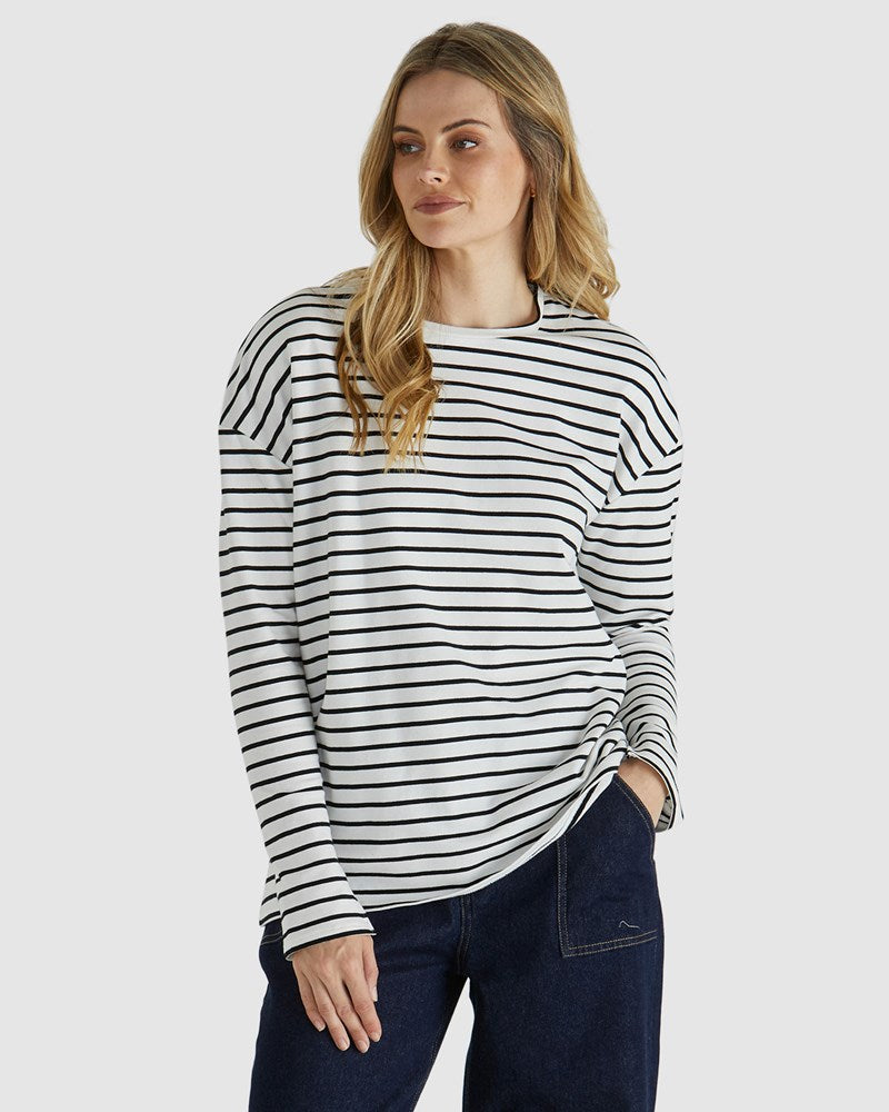 Image of a model wearing Tops. Product name - Alma Top White/Black in White/Black colour by brand - Sass Clothing