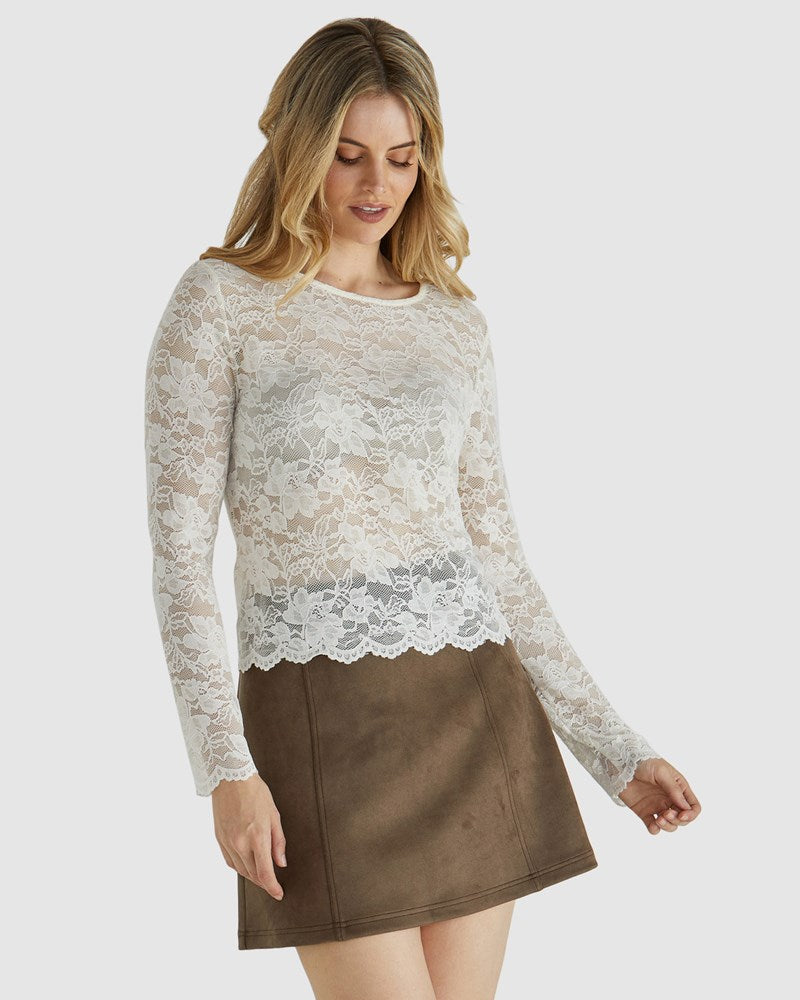 Image of a model wearing Tops. Product name - Dove Top Ivory in Ivory colour by brand - Sass Clothing