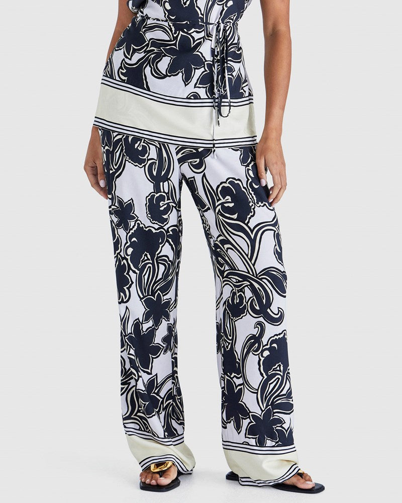 Image of a model wearing Pants. Product name - Esme Pant Imprint Floral in Imprint Floral colour by brand - Sass Clothing