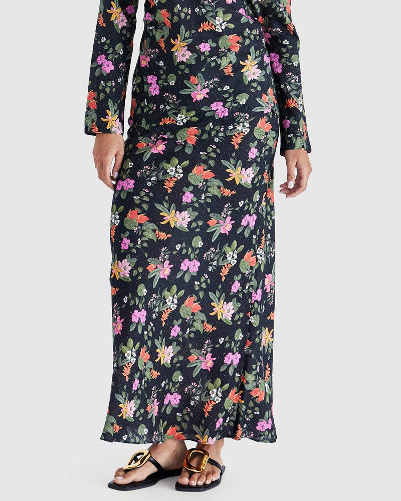Image of a model wearing Skirts. Product name - Beckett Bias Skirt Night Garden in Night Garden colour by brand - Sass Clothing