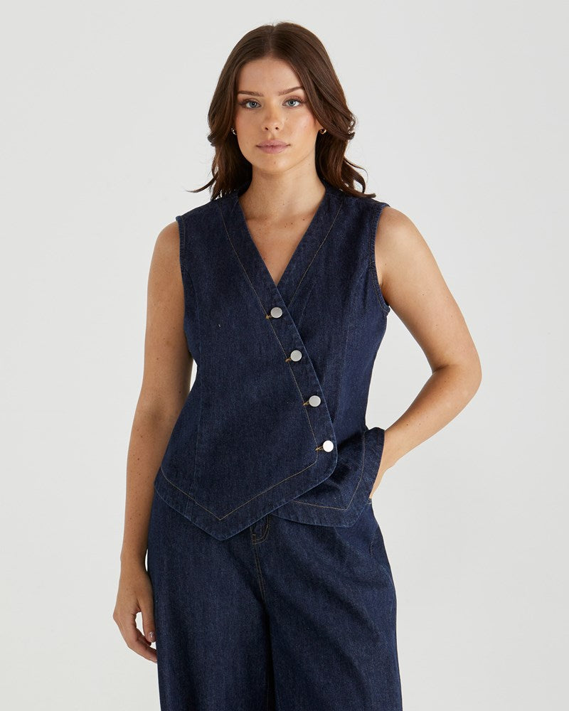 Image of a model wearing Tops. Product name - Myla Vest Dark Rinse in Dark Rinse colour by brand - Sass Clothing