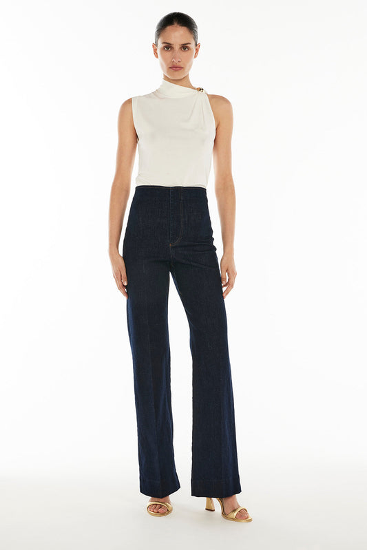 Image of a model wearing Denim. Productname: Limitarian Jean in INDIGO colour by brand - Manning Cartell