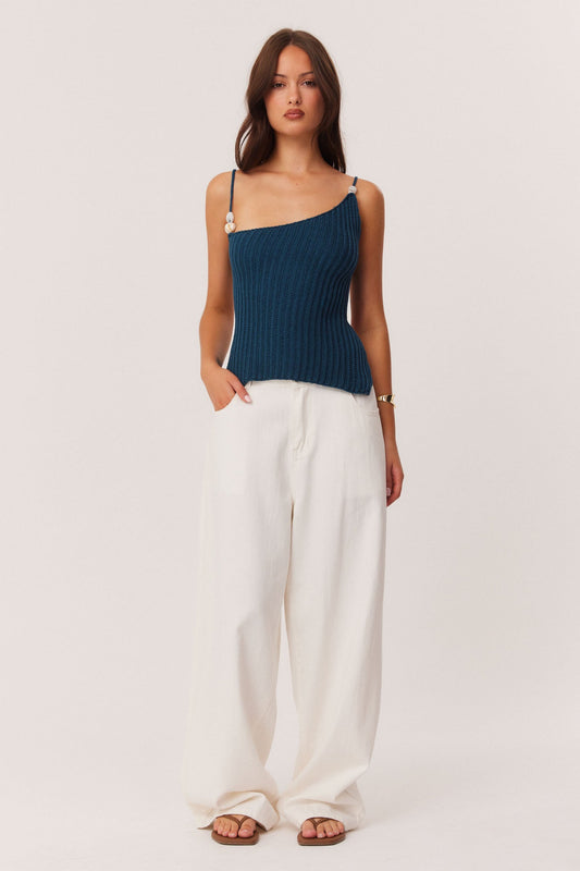 Image of a model wearing Tops. Productname: SNDYS DESI OPEN BACK TOP in Teal colour by brand - SNDYS