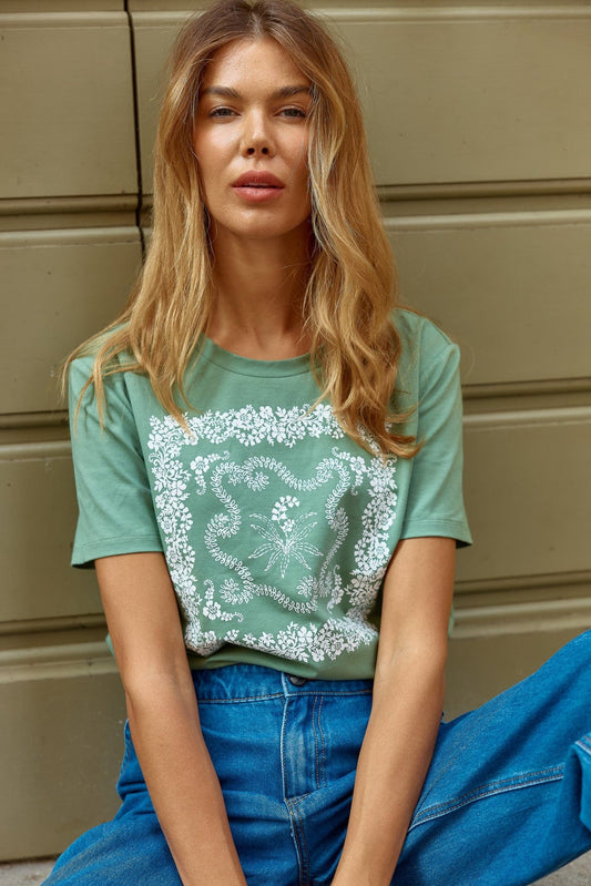 Image of a model wearing Tops. Productname: Betty Basics Ellia Crew Tee Floral Print in Floral Print colour by brand - Betty Basics