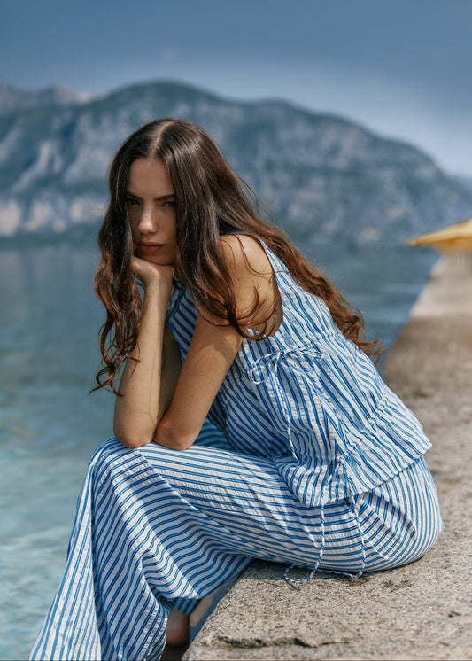 Image of a model wearing Tops. Product name - Aziza Gathered Tie Top Blue/White Stripe in Blue/ White Stripe colour by brand - Sass Clothing