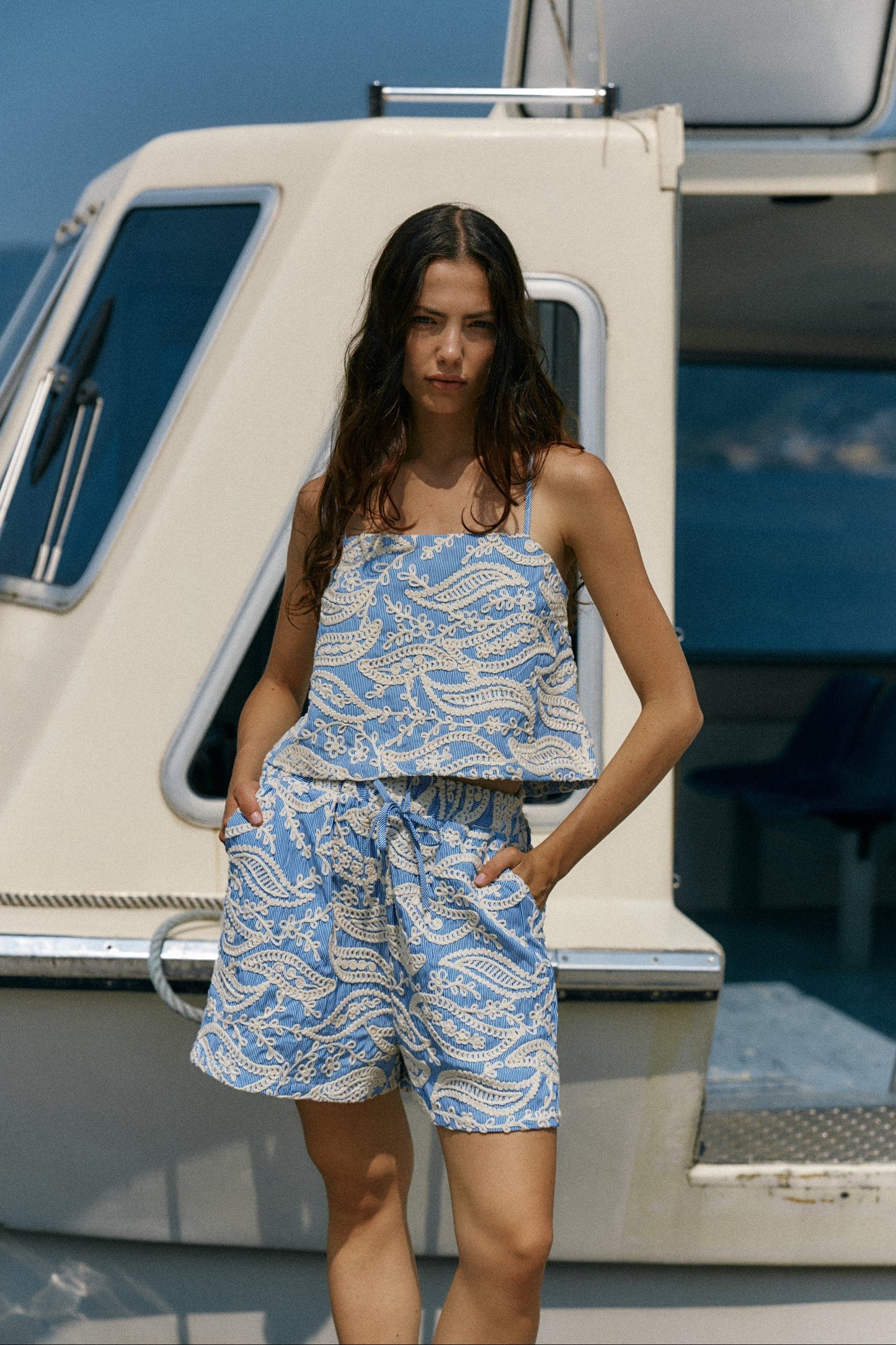Image of a model wearing Shorts. Product name - Kaia Short Blue/White Stripe in Blue/ White Stripe colour by brand - Sass Clothing