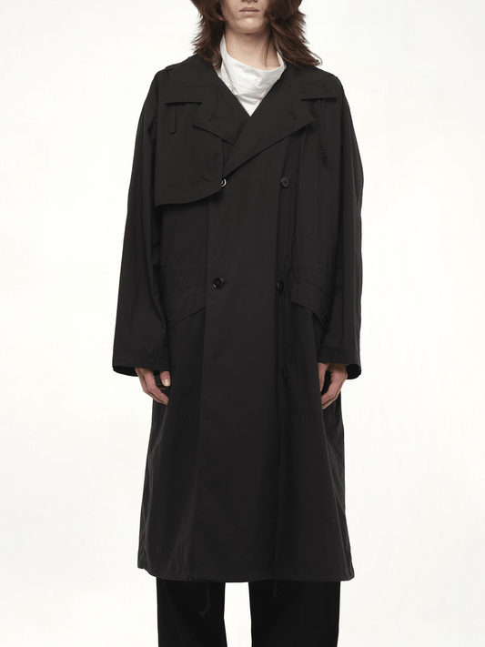 Image of a model wearing Outerwear. Productname: LEMAIRE Light Hooded Trench in Black colour by brand - LEMAIRE