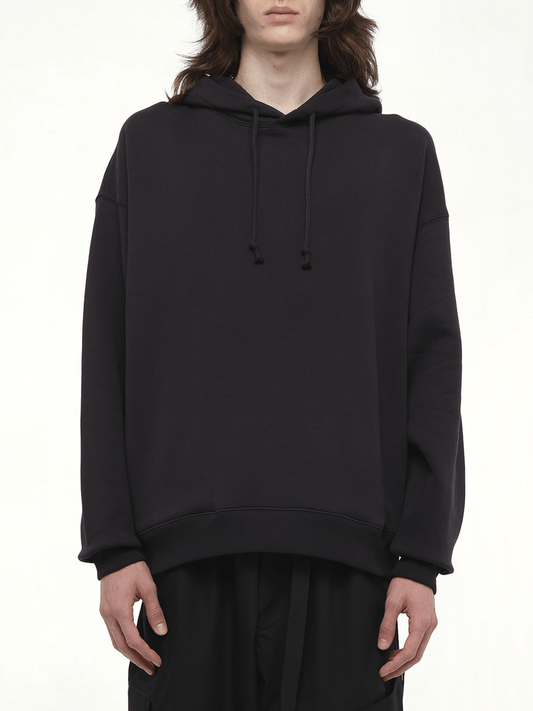 Image of a model wearing Outerwear. Productname: Y-3 Graphic Hoodie in Black colour by brand - Y-3
